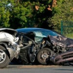 A vehicle accident: one car has t-boned another
