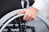 Person in a wheelchair that may need Social Security Disability benefits.